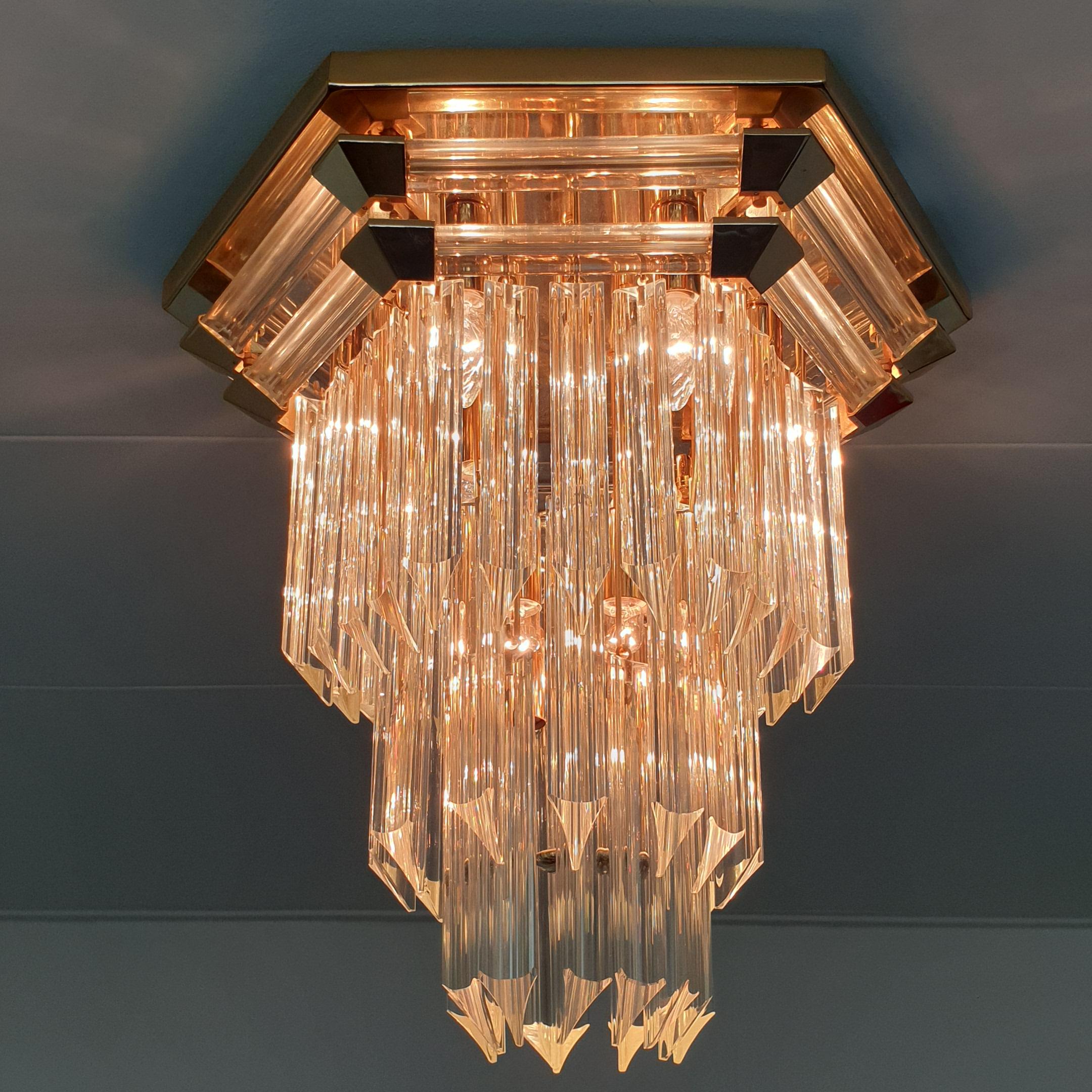 Gold-plated and crystal glass ceiling lamp by Bakalowits & Söhne.
Made in Austria.
With 48 crystal glass cones and 14 little E14 fittings.

The Bakalowits company was founded in 1845 by Elias Bakalowits and they create stunning lights.