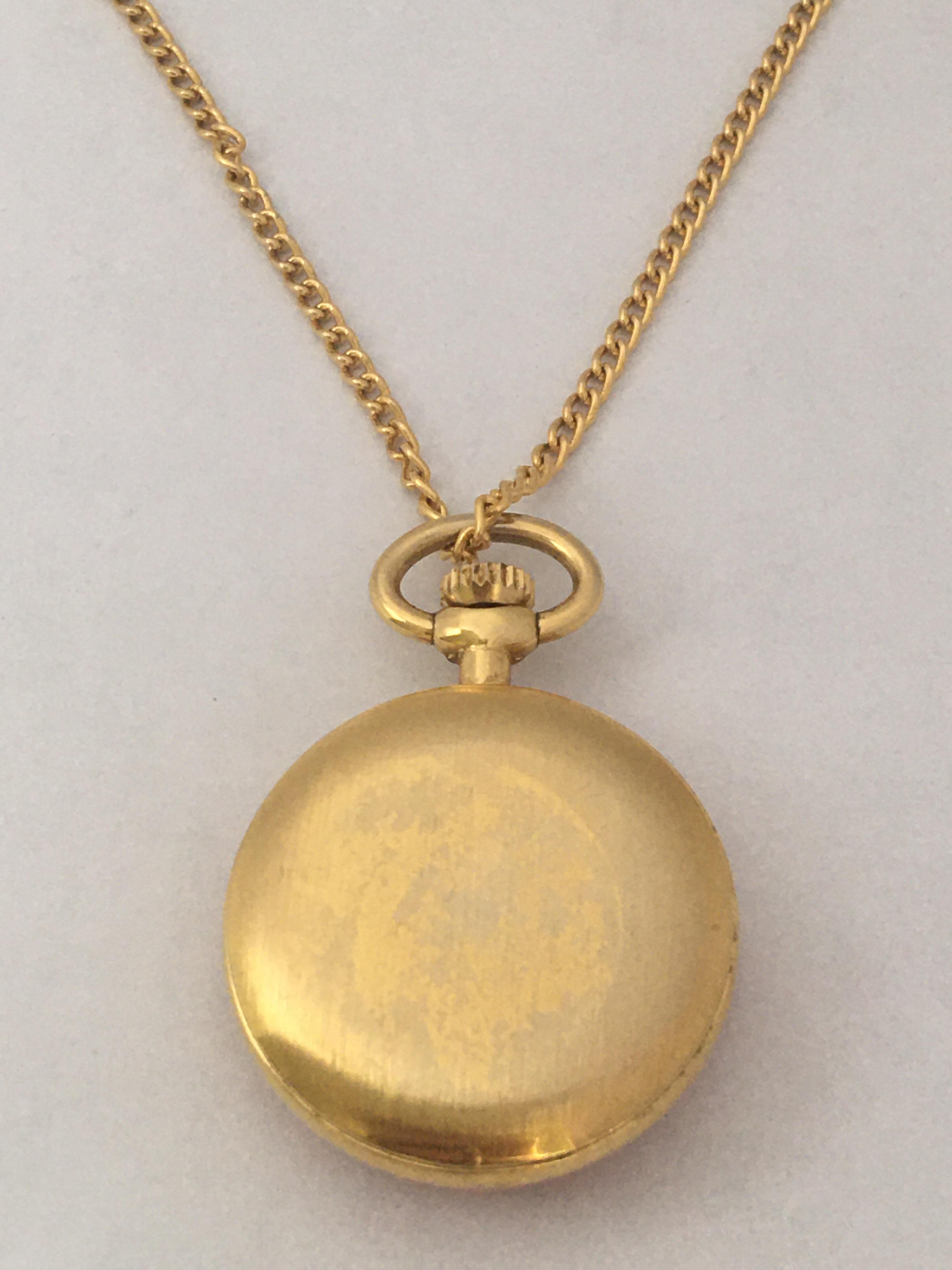 This beautiful vintage hand winding pendant/ pocket watch is in good working condition and it is running well. Visible signs of ageing and wear with the gold plated case is a bit tarnished as shown. It comes with a gold plated necklace/ chain 