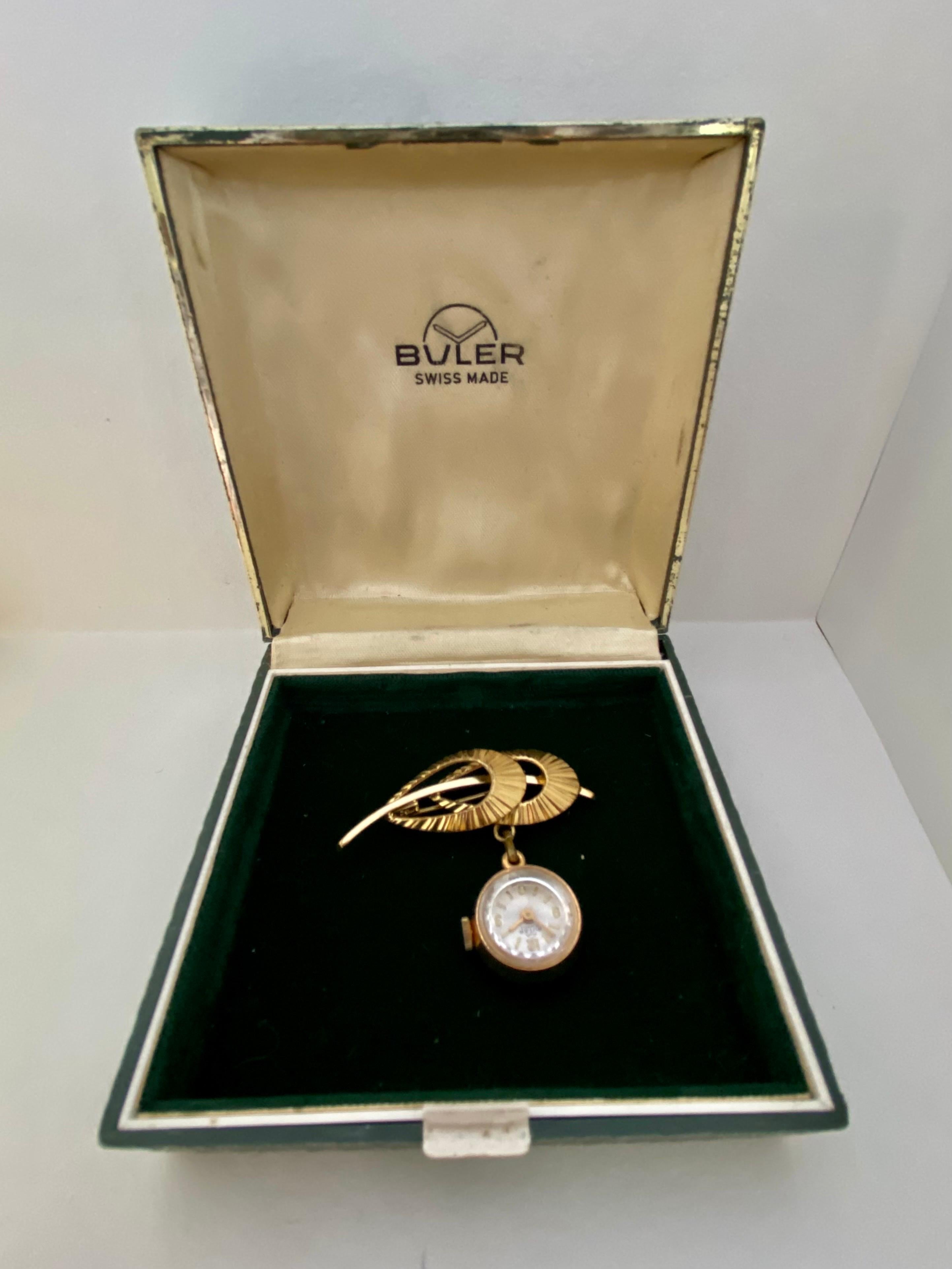 This beautiful mechanical brooch watch is in good working condition and it is running well. Visible signs of ageing and wear tiny surface marks on the watch case. It comes with a presentation box. Please study the images carefully as part of the