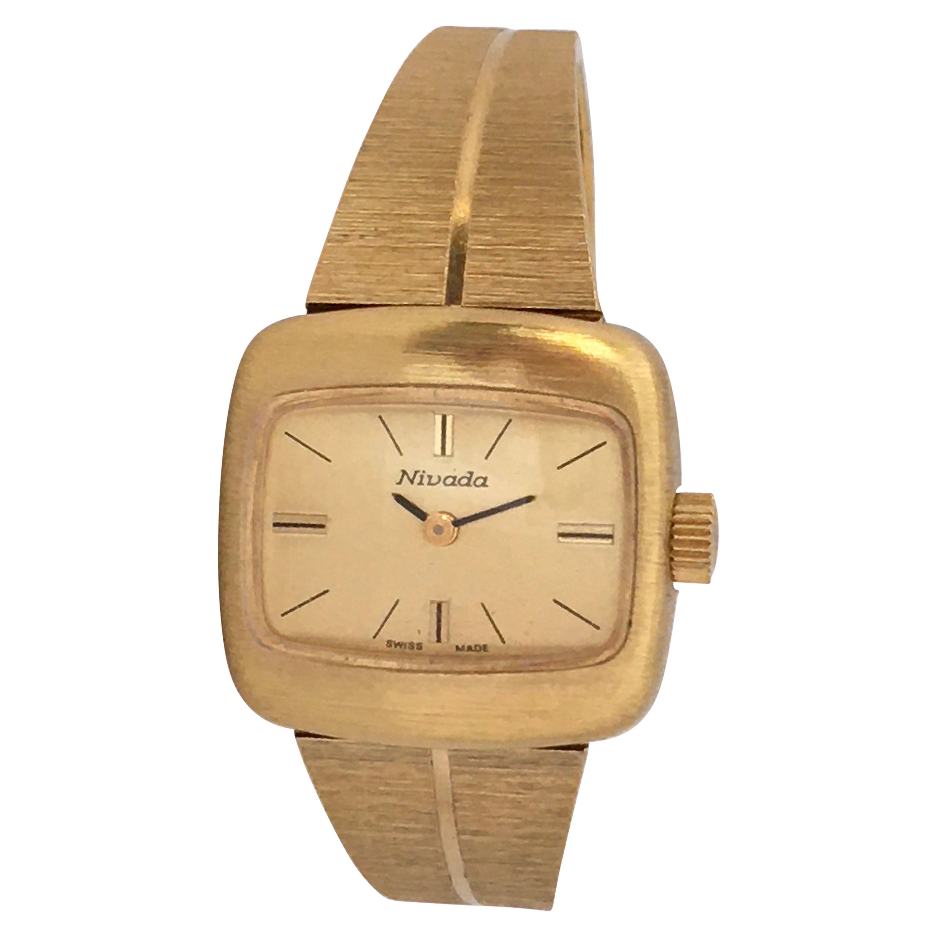 Vintage Gold-Plated Bangle Mechanical Nivada Swiss Ladies Watch at 1stDibs  | nivada ladies watch, swiss made 24k gold plated price, nivada tank watch