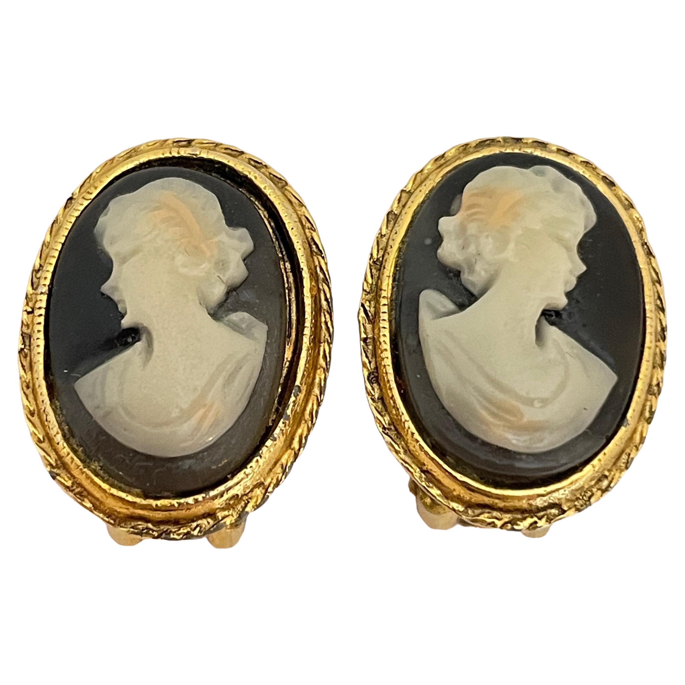 Vintage gold plated carved camel designer clip on earrings For Sale