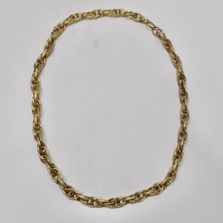 Do not miss out on this classic 1980s gold chain necklace! This stunning 18K yellow gold plated chain link necklace is so versatile and perfect for any occasion! The perfect length staple chain necklace that will pair beautifully with anything in
