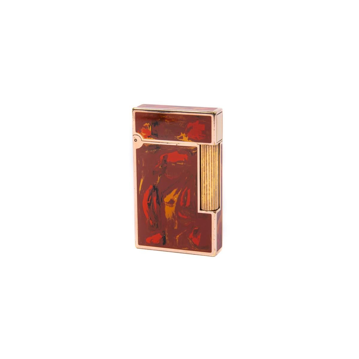Vintage Authentic Gold plated Ligne 2 ST Dupont Lighter in Red Lacquer 1990s

The iconic S.T. Dupont name is known for quality, well-made cigarette lighters and other luxury implements. The company’s origin can be traced to Simon Tissot-Dupont