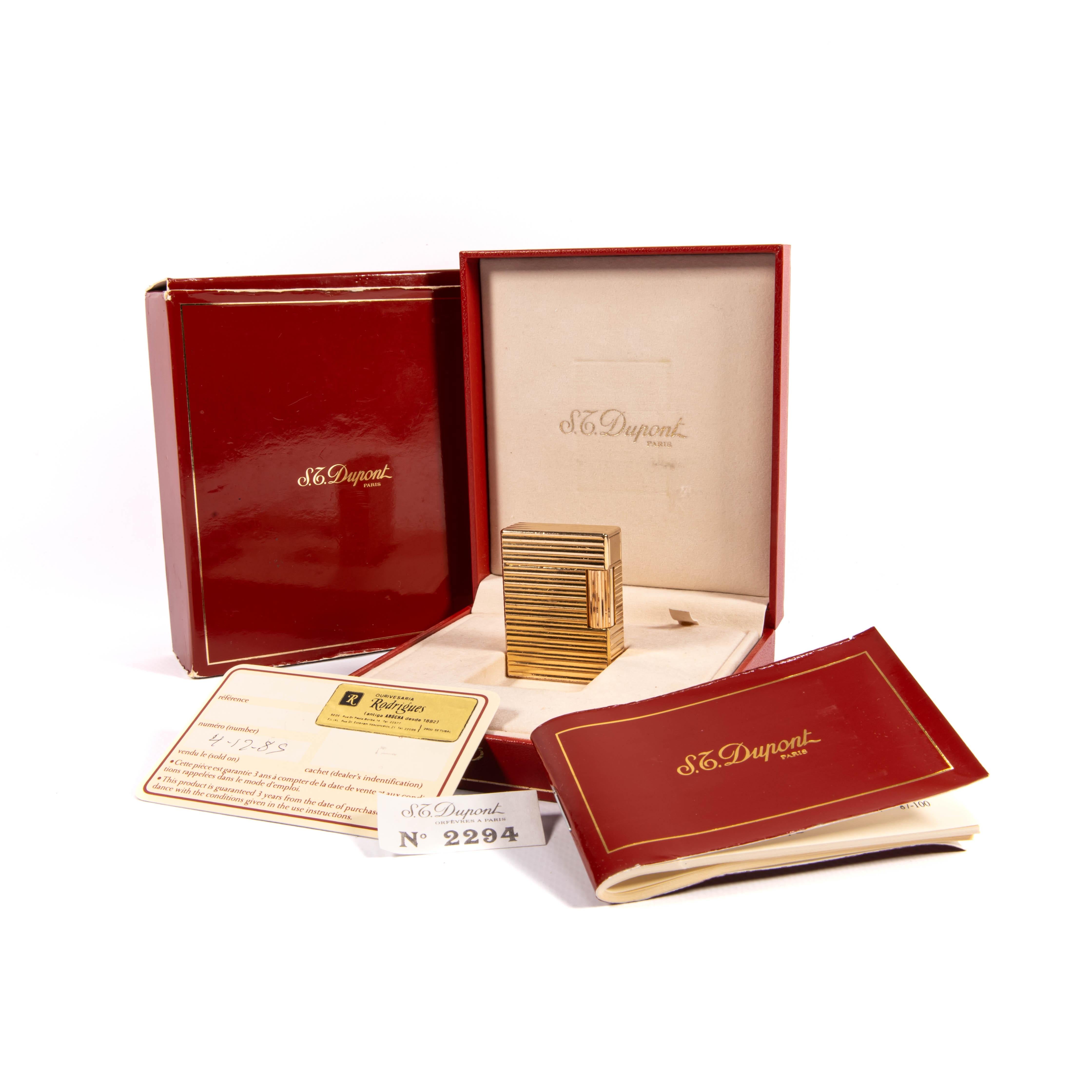 Vintage Gold Plated Ligne 1 BR ST Dupont Lighter

The iconic S.T. Dupont name is known for quality, well-made cigarette lighters and other luxury implements. The company’s origin can be traced to Simon Tissot-Dupont opening his workshop shop in