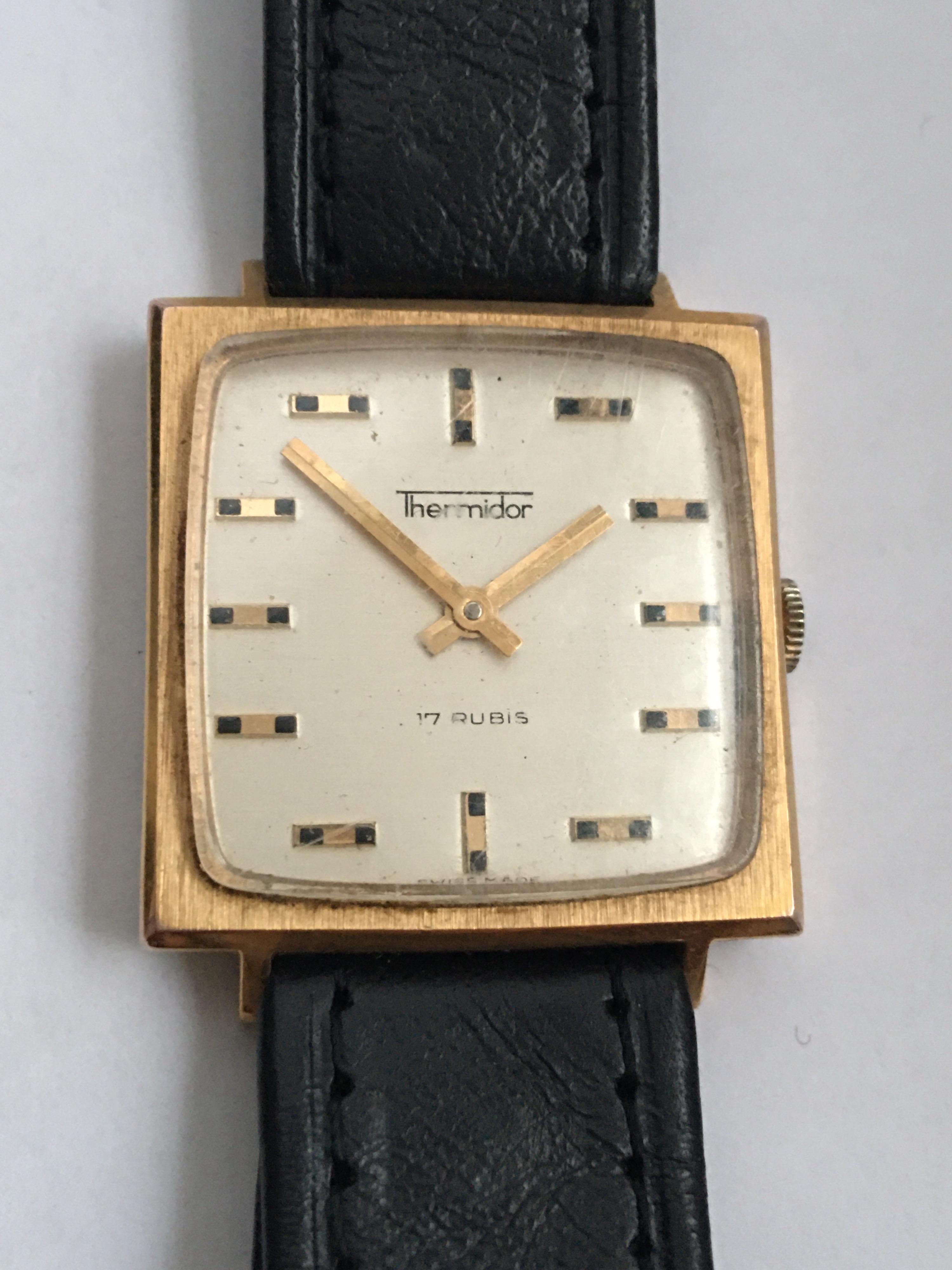 This beautiful Pre-owned vintage mechanical watch is working and is ticking well.  Visible signs of gentle wearing with little scratches on the glass and watch case. Strap is a bit worn with its Silver plated buckle.

Please study the photos