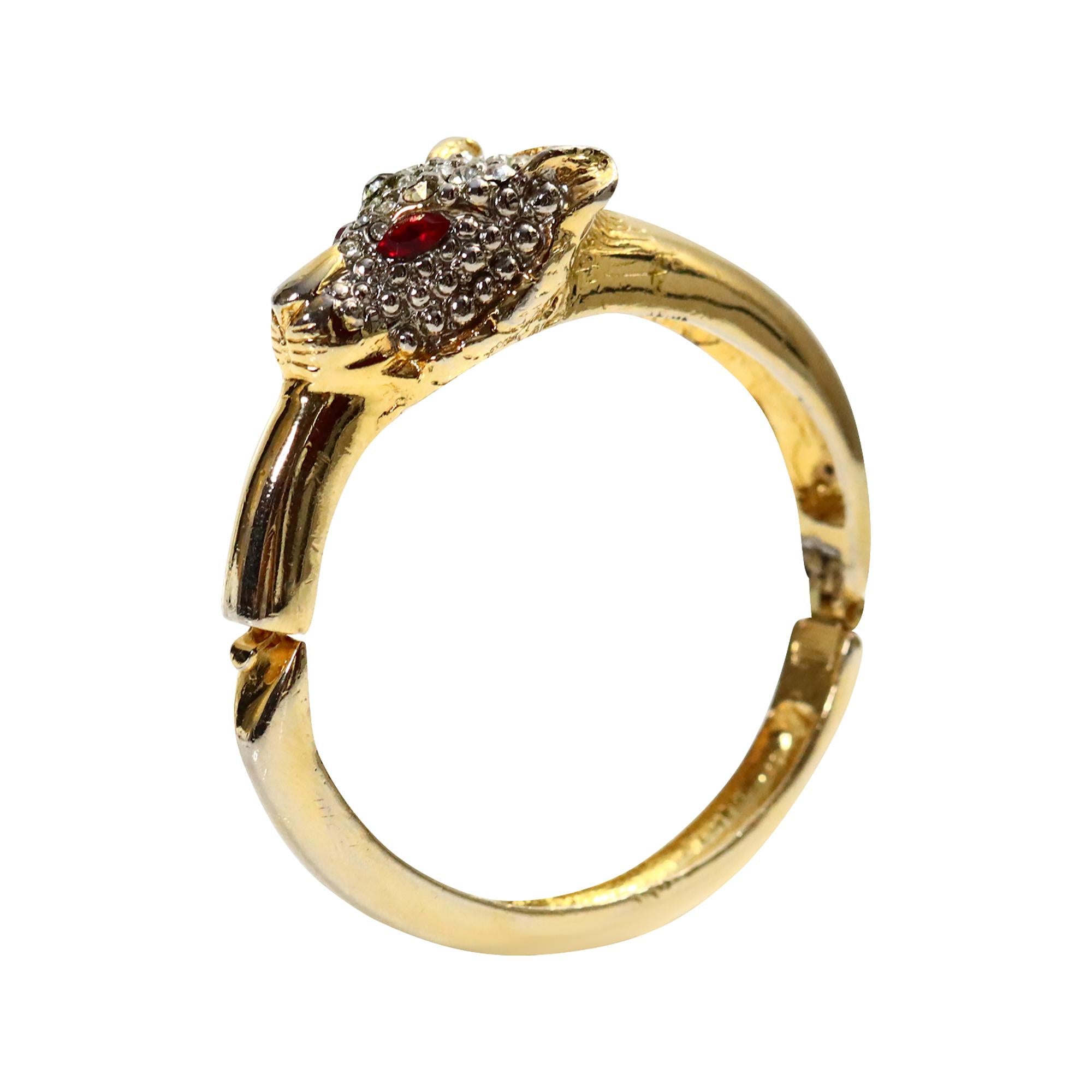 Pulsera vintage de leopardo con diamantes de imitación dorados y ojos rojos Circa años 80 en venta 1