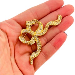 Vintage gold rhinestone bow brooch designer runway