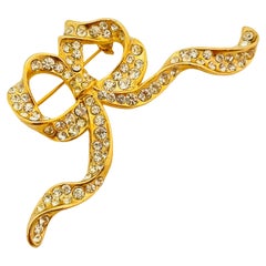 Vintage gold rhinestone bow brooch designer runway