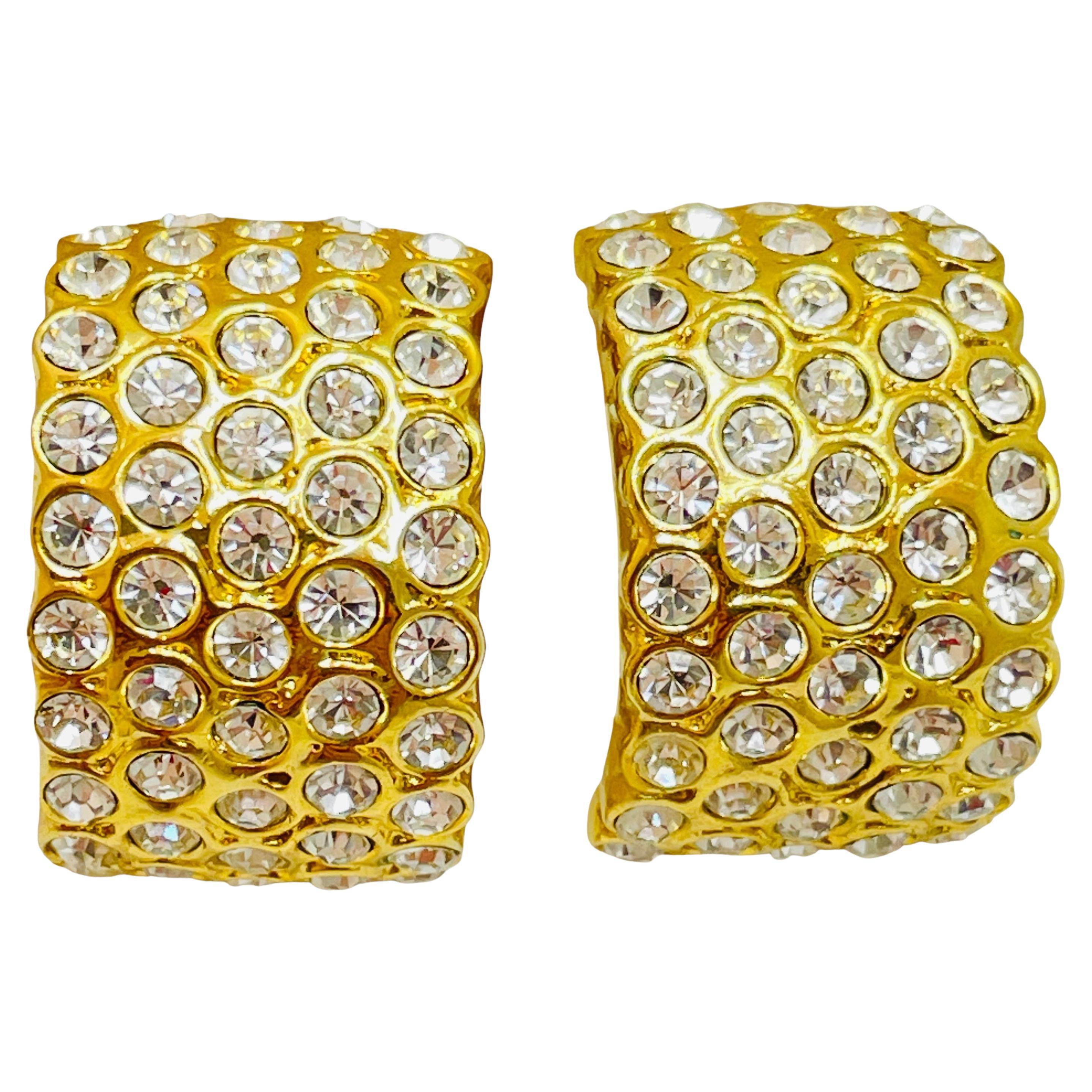Vintage gold rhinestone clip on designer earrings For Sale
