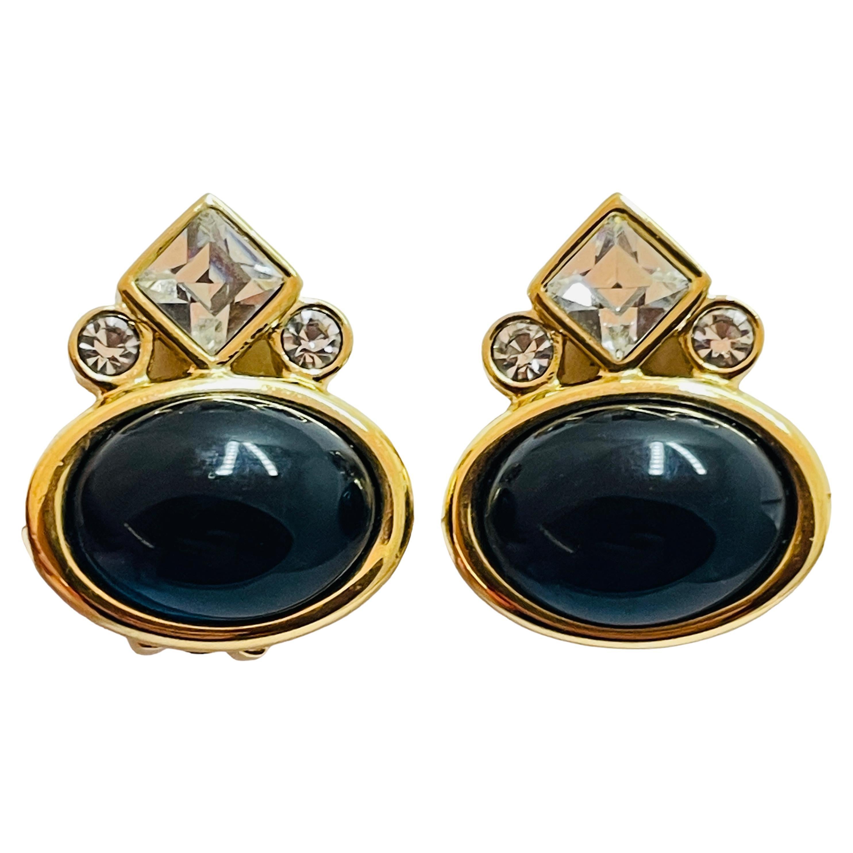 Vintage gold rhinestone clip on designer earrings For Sale