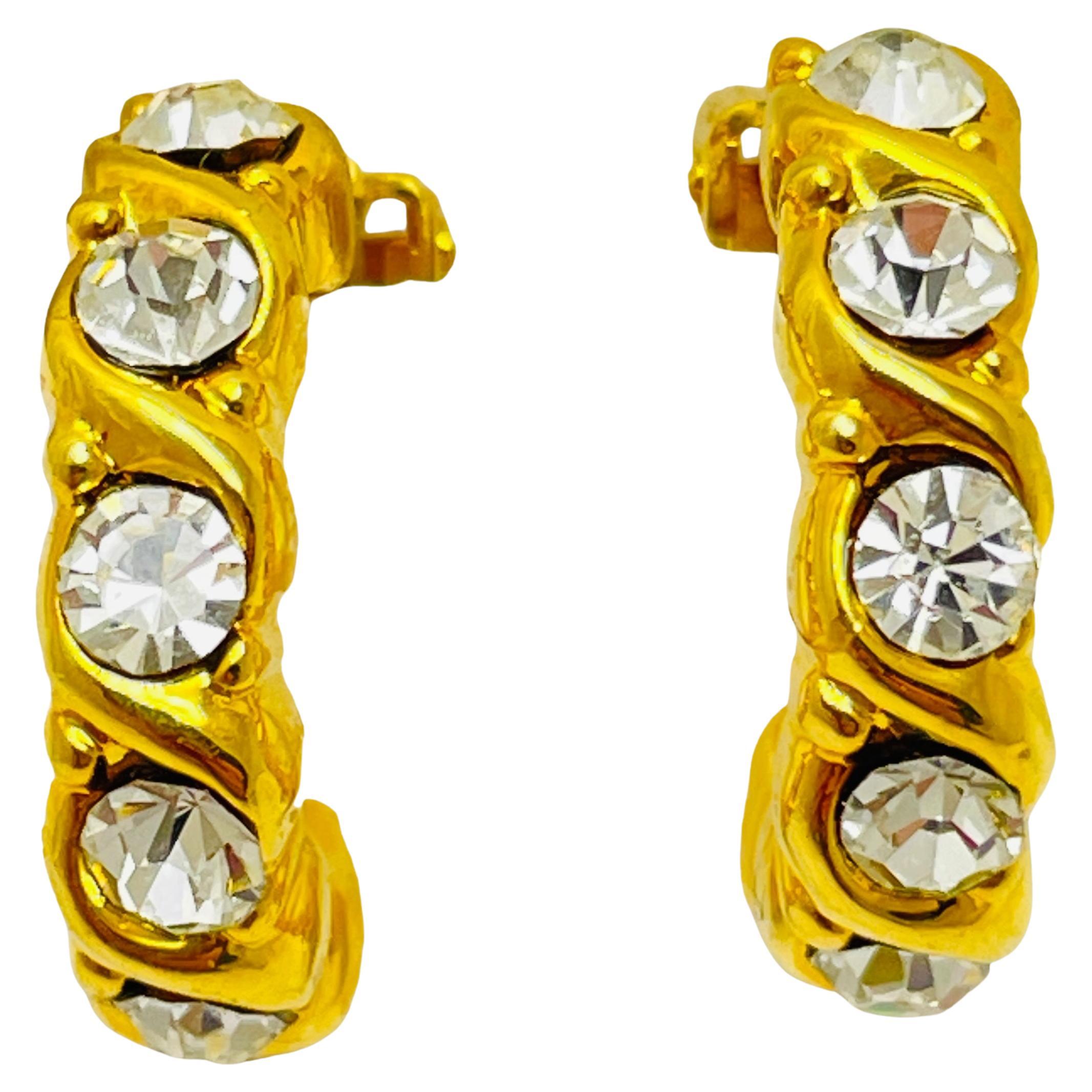 Vintage gold rhinestone designer clip on earrings For Sale