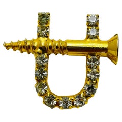 Used gold rhinestone designer designer brooch