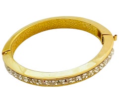 Vintage gold rhinestone designer runway bangle bracelet