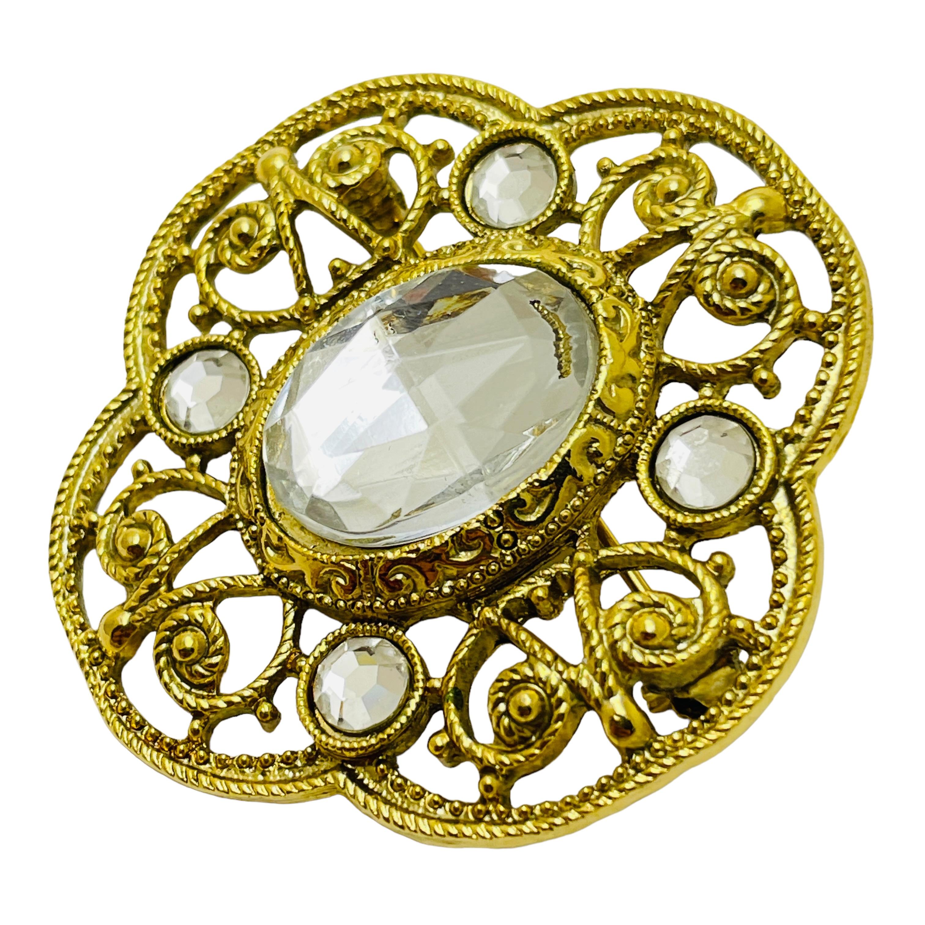 Women's or Men's Vintage gold rhinestone designer runway brooch For Sale