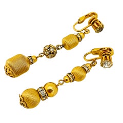 Vintage gold rhinestone designer runway clip on earrings