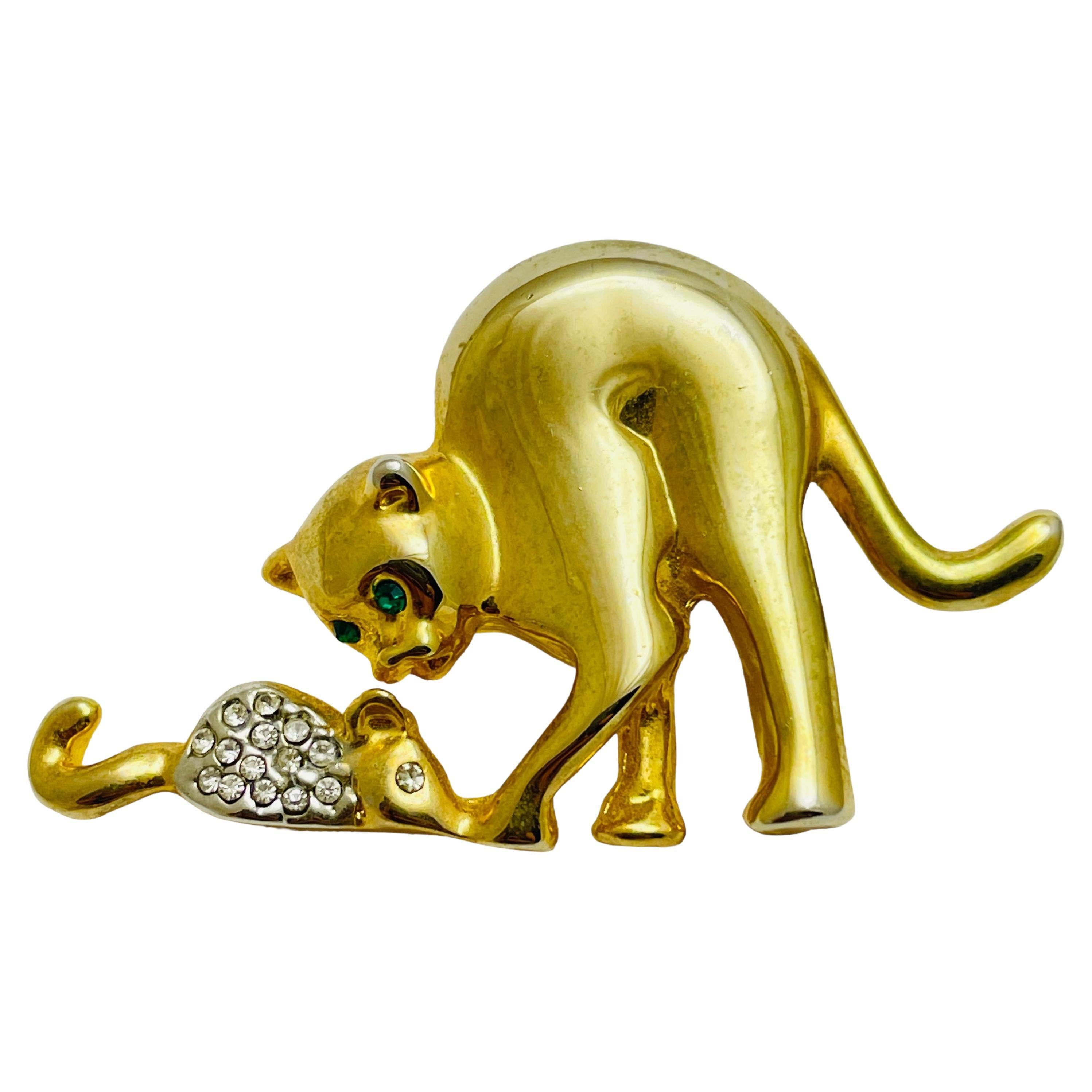 Vintage gold rhinestone emerald eyes cat designer brooch