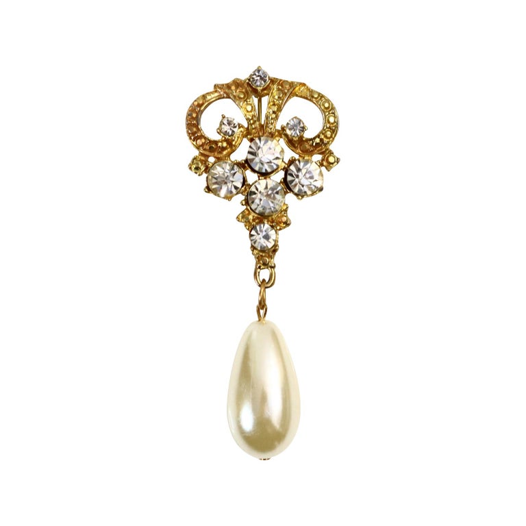 Vintage Gold Rhinestone with Faux Dangling Pearl Brooch Circa 1960s. Just the nice brooch to jazz you up.