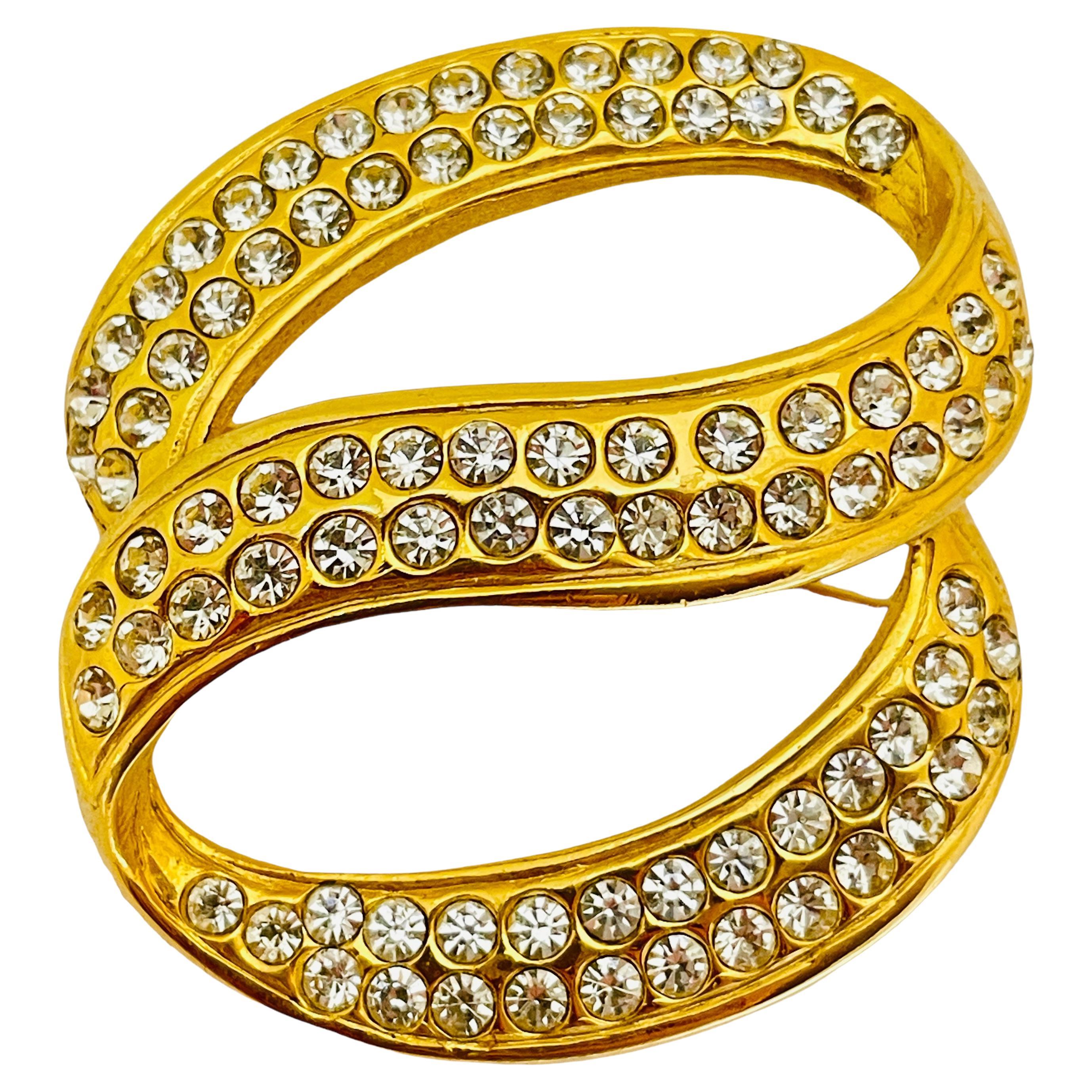 Vintage gold rhinestones designer runway brooch For Sale
