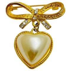 Vintage gold rhinestones pearl dangle heart bow designer brooch