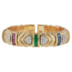 Vintage Gold Rigid Bangle with Sapphires, Emeralds, Rubies and Diamonds