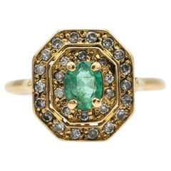 Vintage gold ring with diamonds and emerald, France, 1960s. 