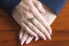 Vintage gold ring with diamonds and emeralds, London, UK.
