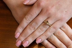 Anello d'oro vintage con rubini e diamanti, circa anni '70.