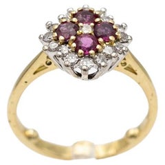 Vintage gold ring with rubies and diamonds