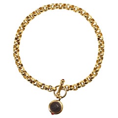Vintage Gold Rollo Kette mit Toggle und baumelnden Münze Halskette, circa 1990er Jahre