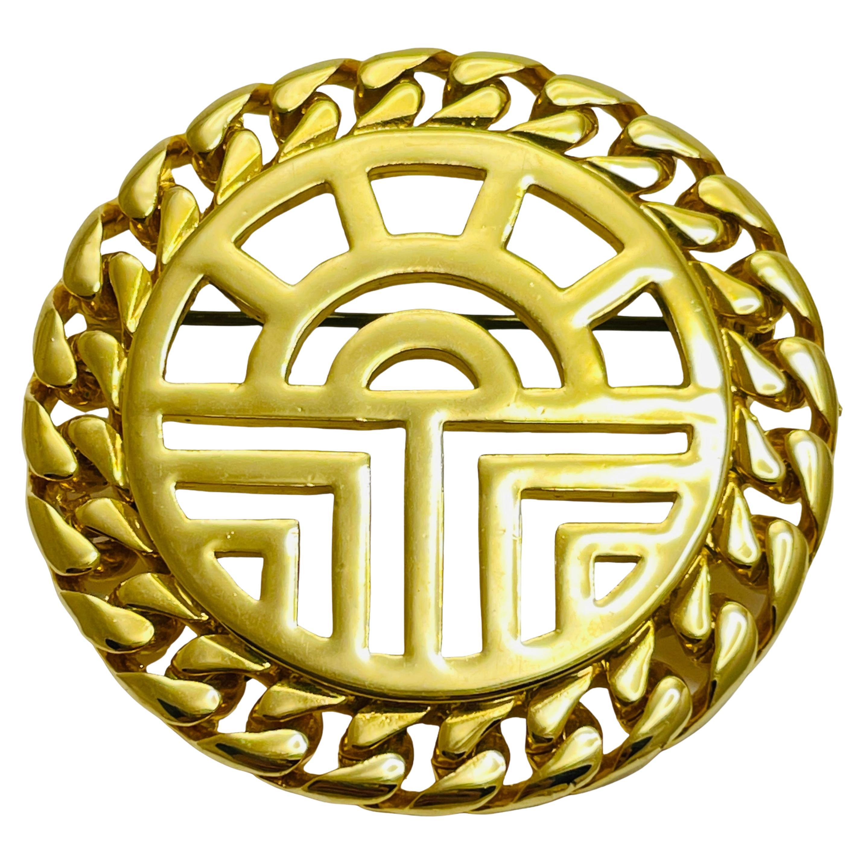 Vintage gold round chain designer brooch