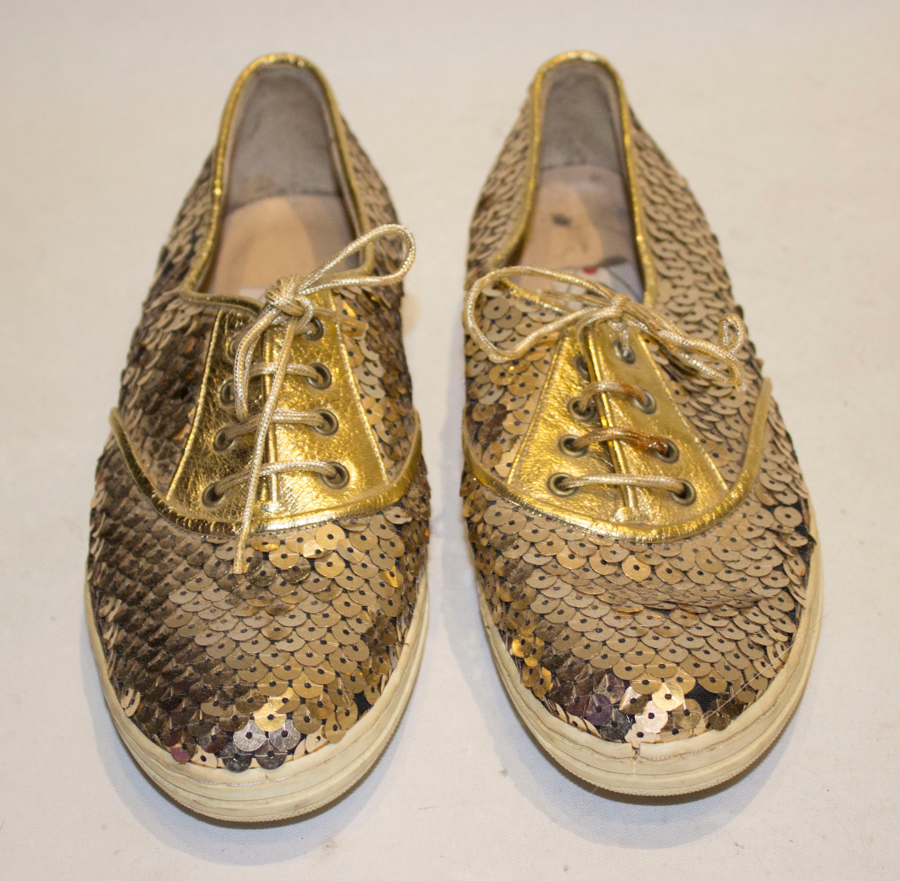 Perfect for running around in this Christmas /New Year,. These beautifuly made shoes will brighten any outfit. They have leather soles and lining and gold laces . Size 36 1 /2.