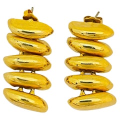 Vintage gold shiny modernist drop designer runway earrings