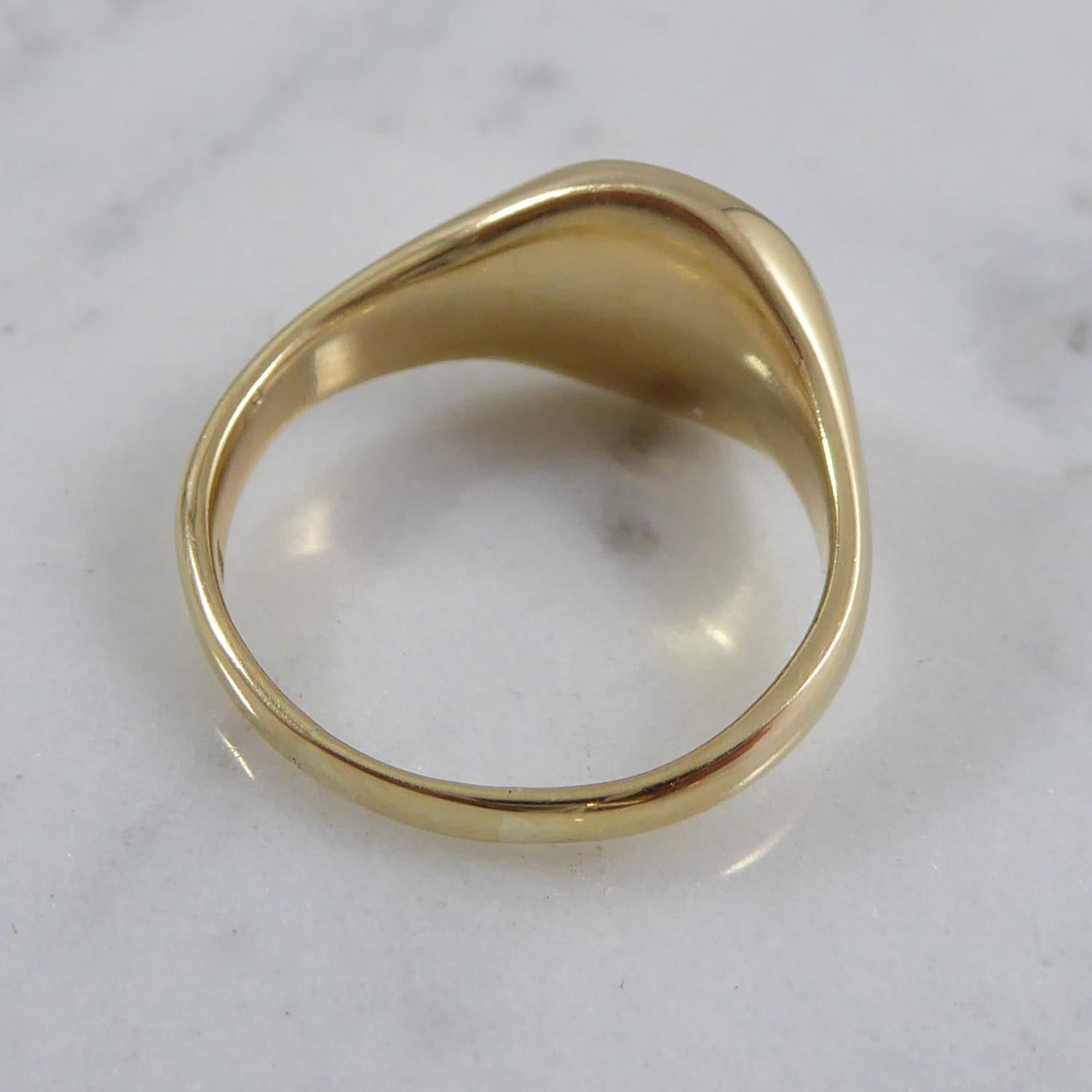 Dating from circa 1930s, this is a very nice quality signet ring in 9ct yellow gold and engraved in a classical design with a bird showing raised wings.

The ring has very softly rounded edges and would be really comfortable to wear on a day-to-day