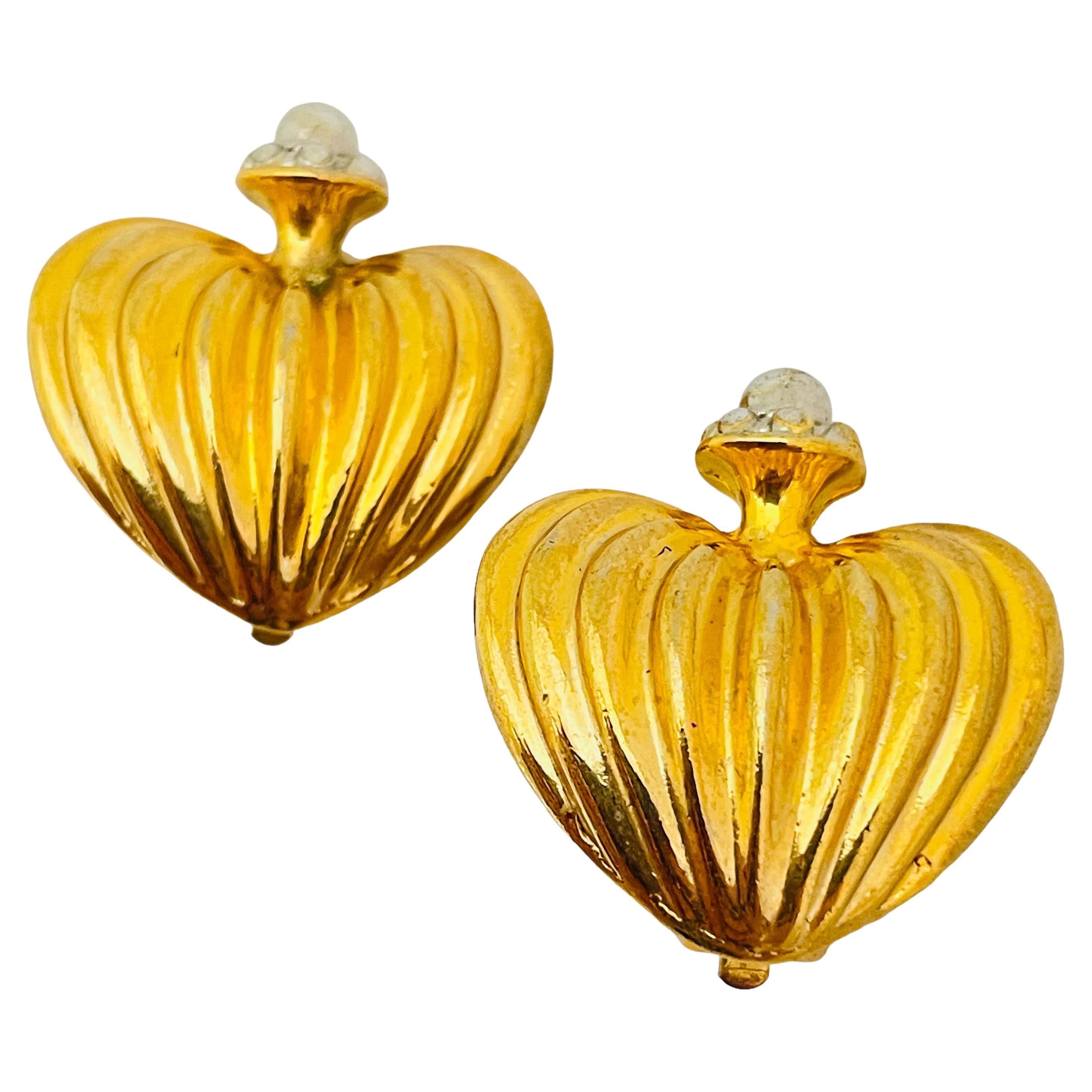 Vintage gold silver designer runway clip on earrings For Sale