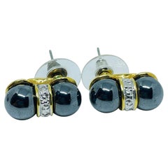 Orecchini vintage con perline di vetro color oro e argento