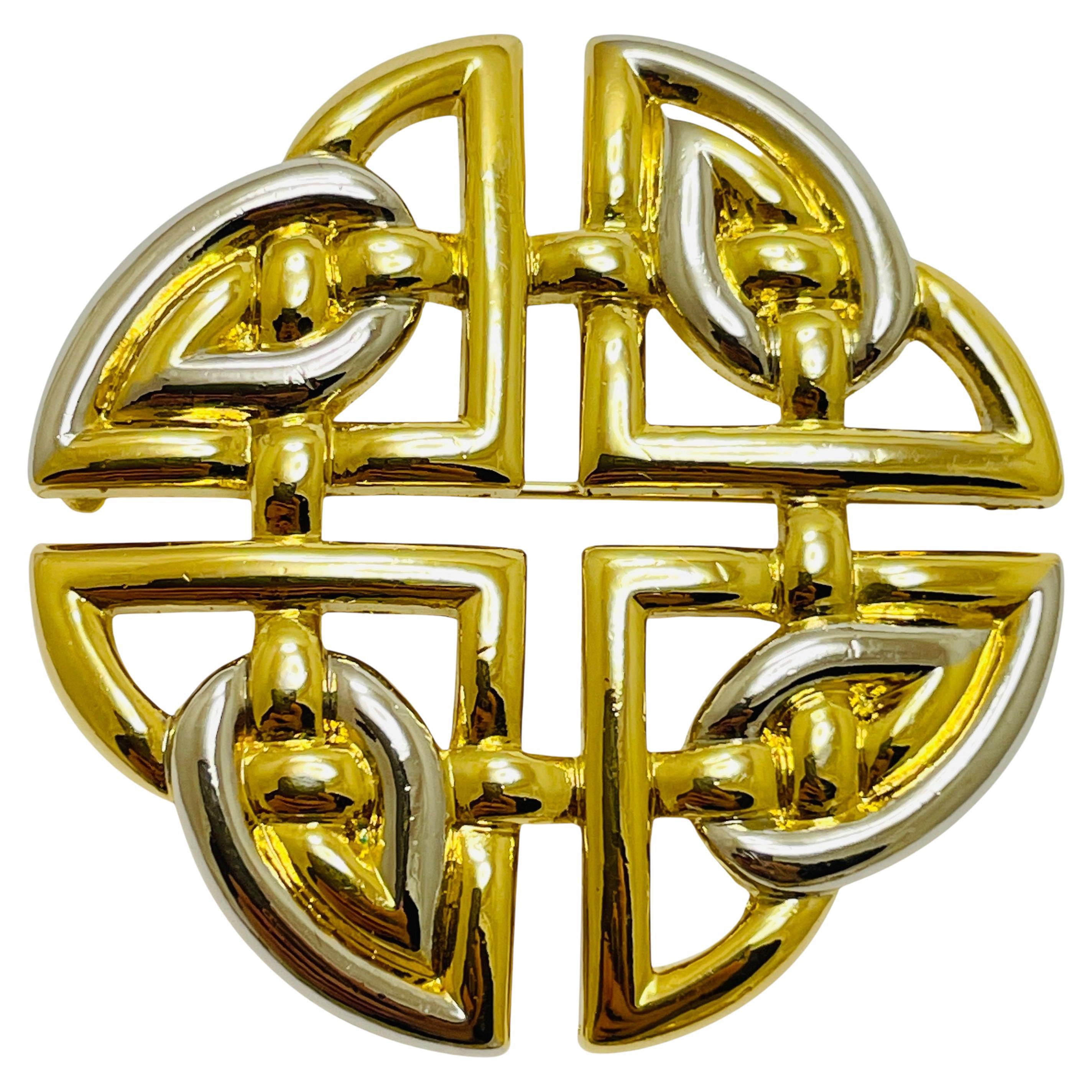 Broche de créateur vintage en or et argent massif en vente