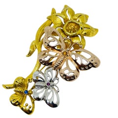 Vintage gold silver tone rhinestone flower butterflies designer brooch