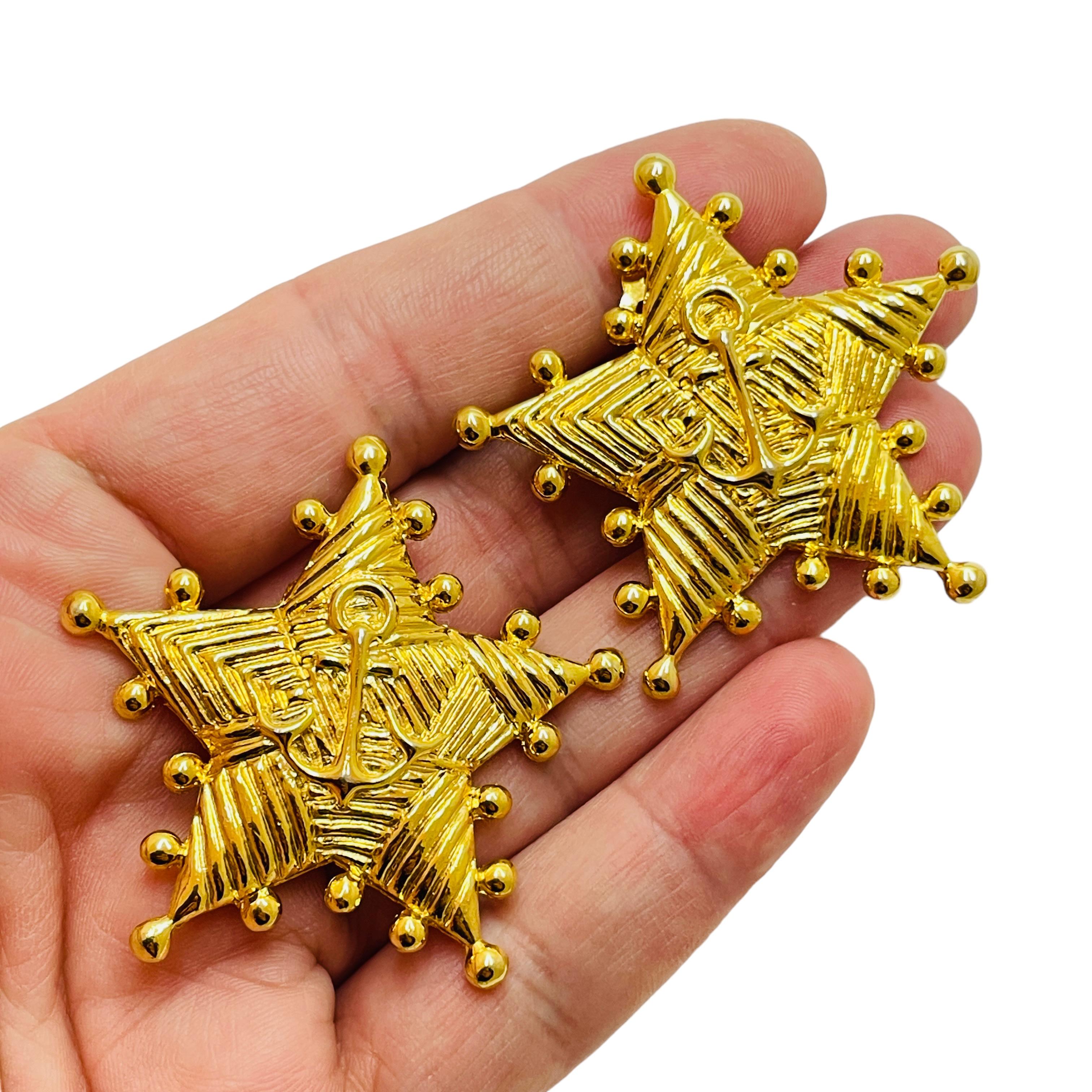 Women's or Men's Vintage gold star nautical clip on designer earrings For Sale