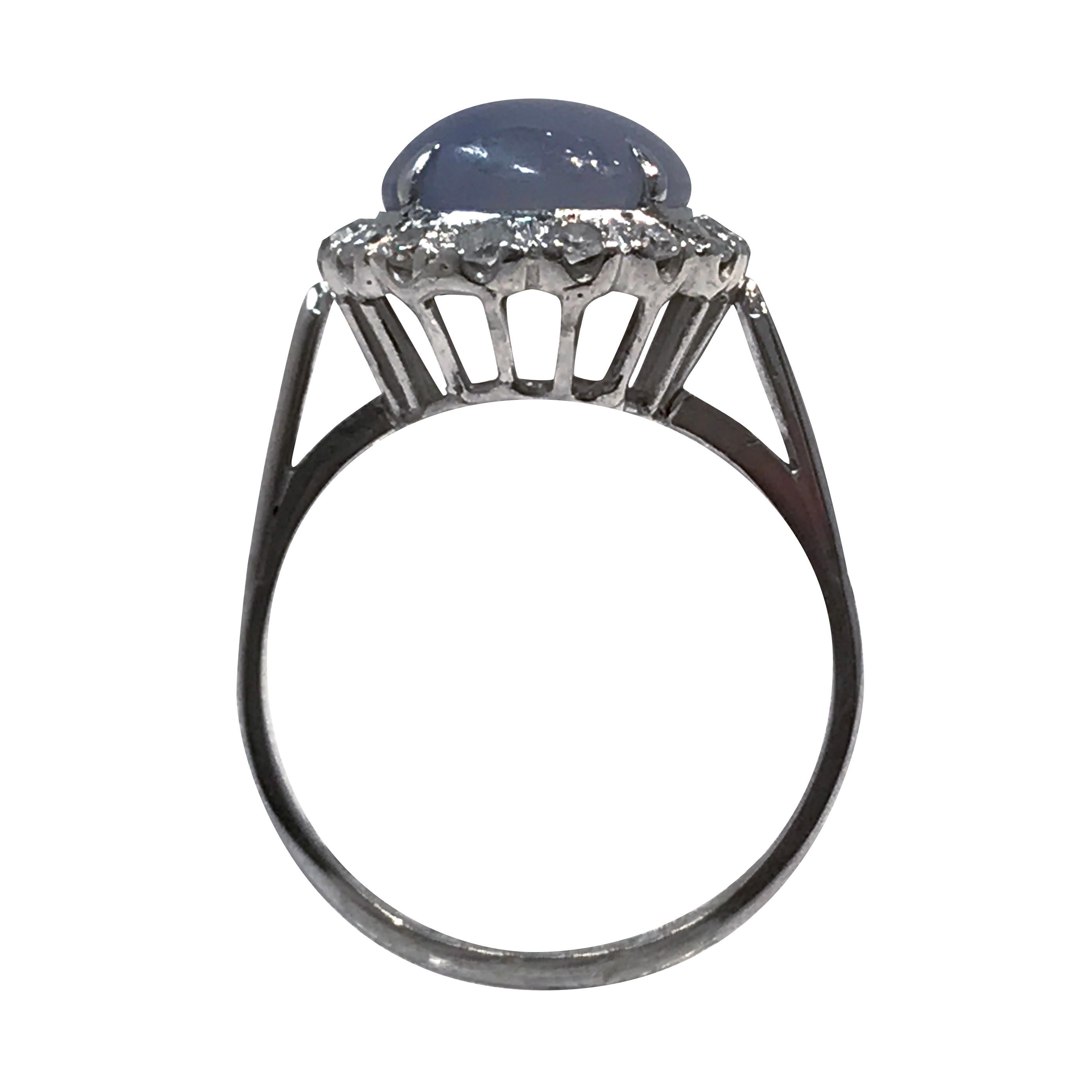 Round Cut Vintage 14 Karat Star Sapphire Diamond Ring, 0.32 Carat For Sale