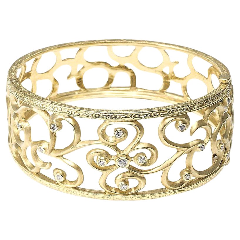 Vintage Gold Swirl and Diamond Bangle, Circa 1990 For Sale