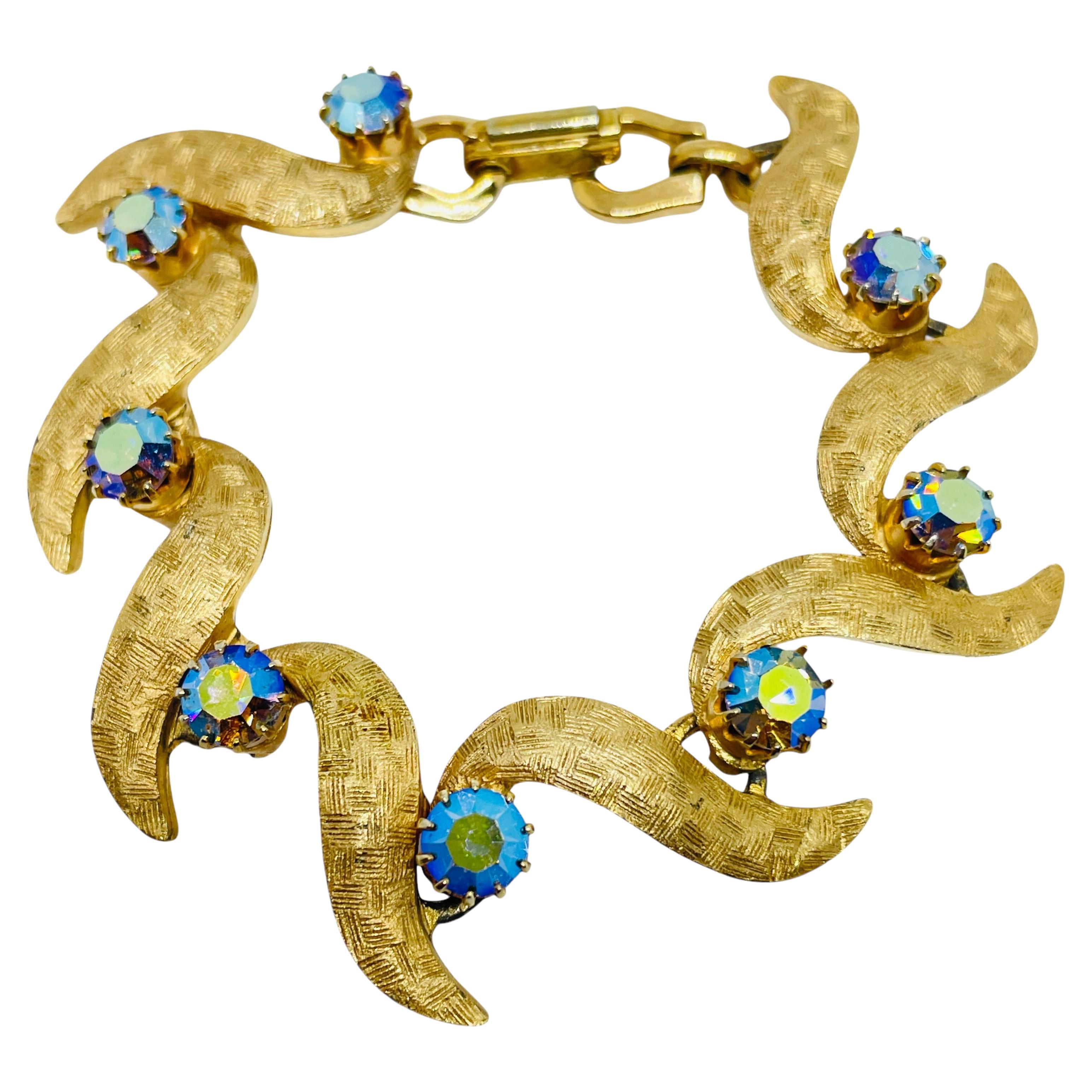 Bracelet vintage en or avec strass en vente