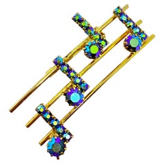 Vintage gold tone ab rhinestone musical notes brooch