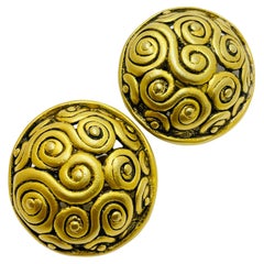 Boucles d'oreilles clips vintage avec abstraction et tonalité dorée