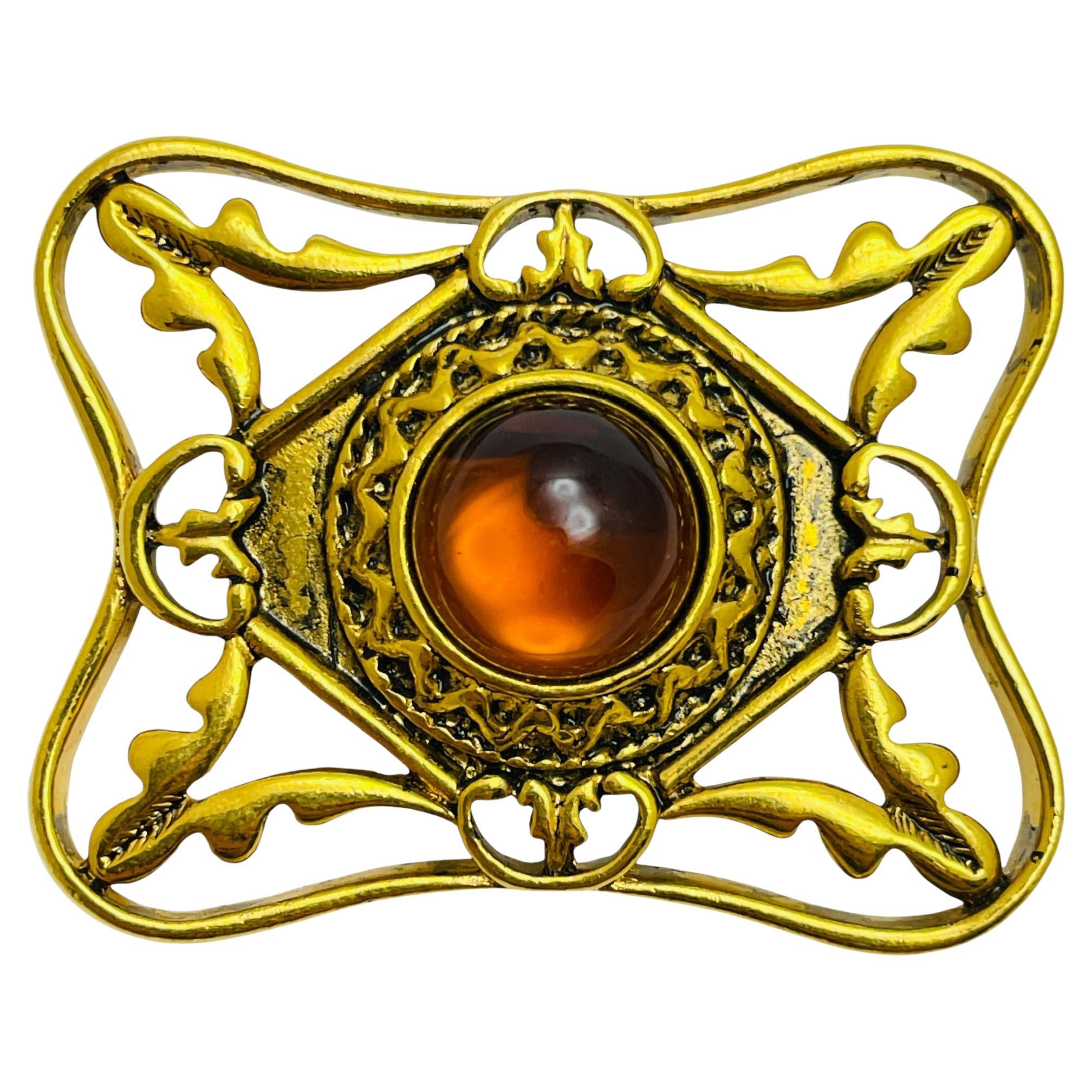 Vintage gold tone amber glass designer brooch