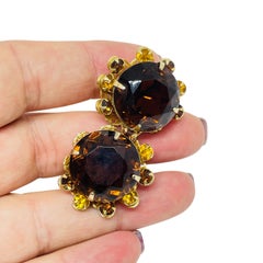 Vintage gold tone amber glass designer clip on earrings