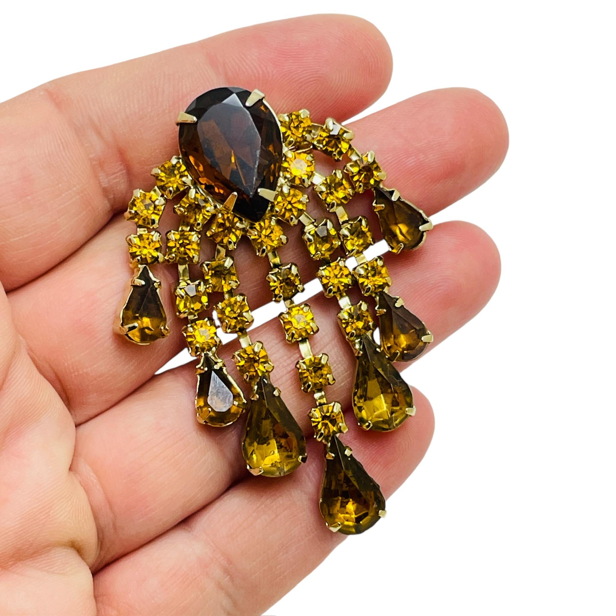 Women's Vintage gold tone amber rhinestone dangle designer brooch For Sale