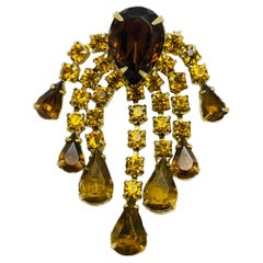 Broche vintage de diseño con brillantitos de ámbar en tono dorado
