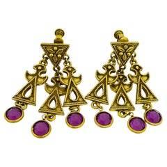 Vintage gold tone amethyst glass dangle designer clip on earrings