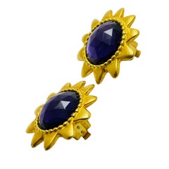 Vintage gold tone amethyst glass designer clip on earrings