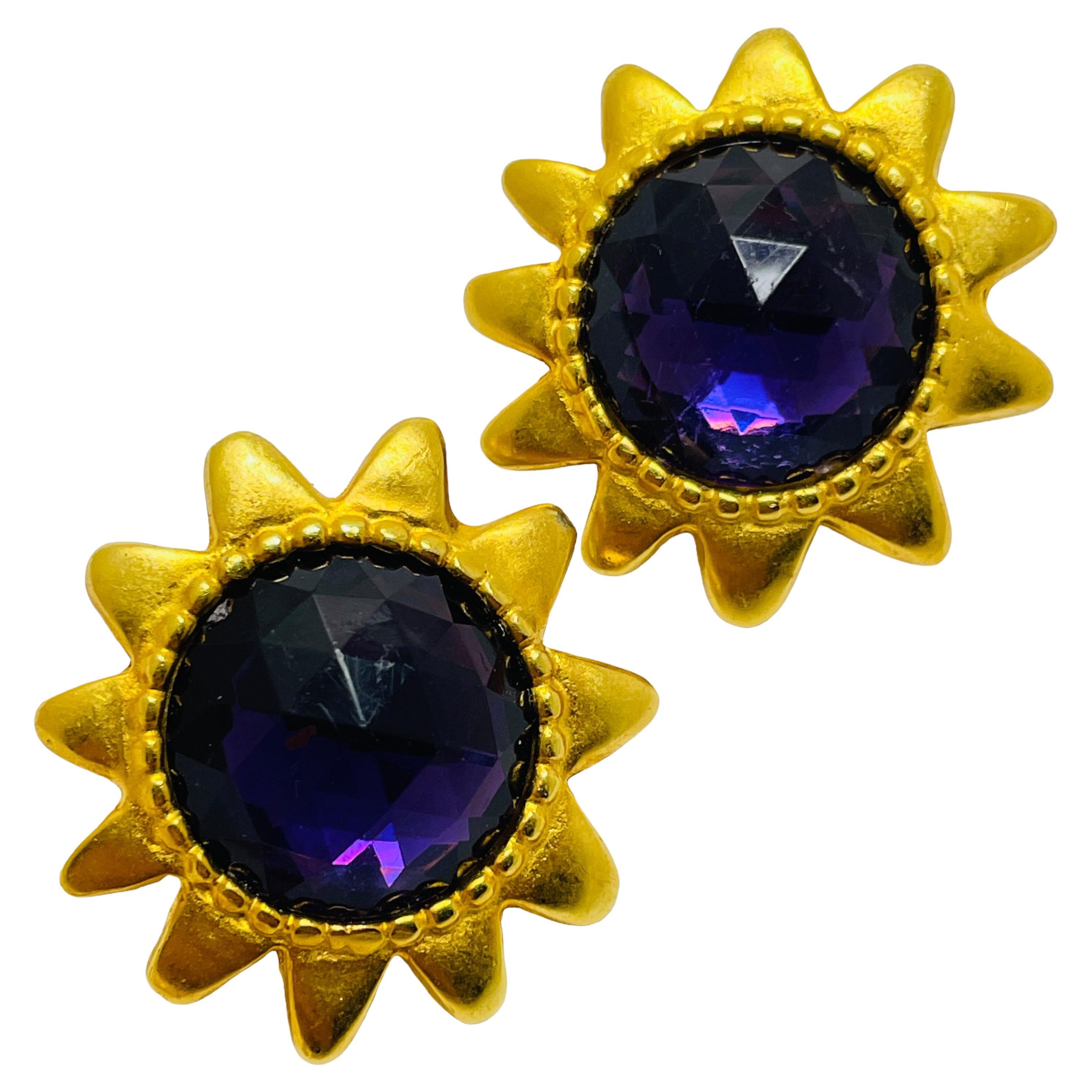 Vintage gold tone amethyst glass designer clip on earrings For Sale
